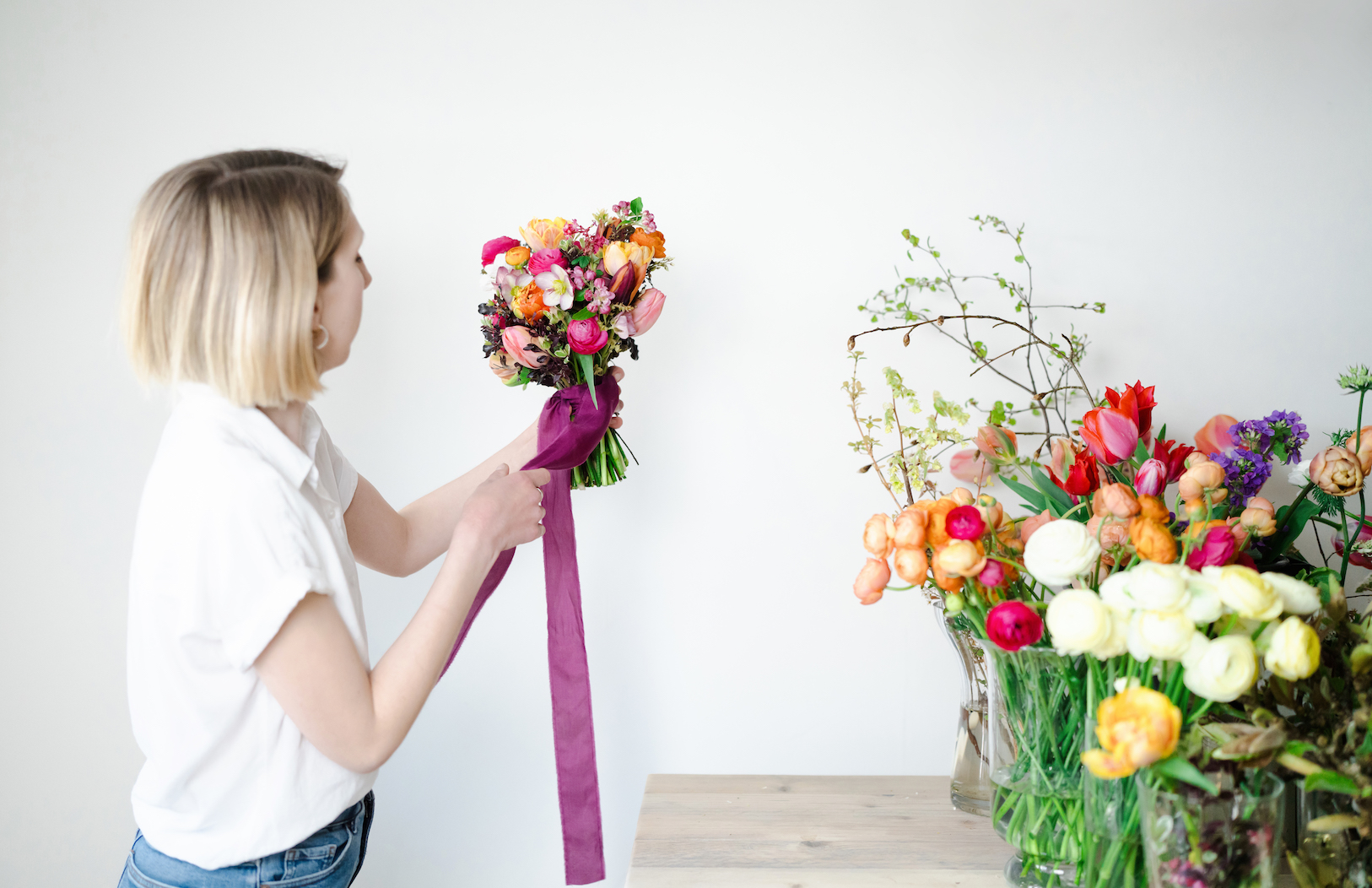 Vanessa Jayne holding bouquet of flowers for Vanessa Jayne Design floral studio